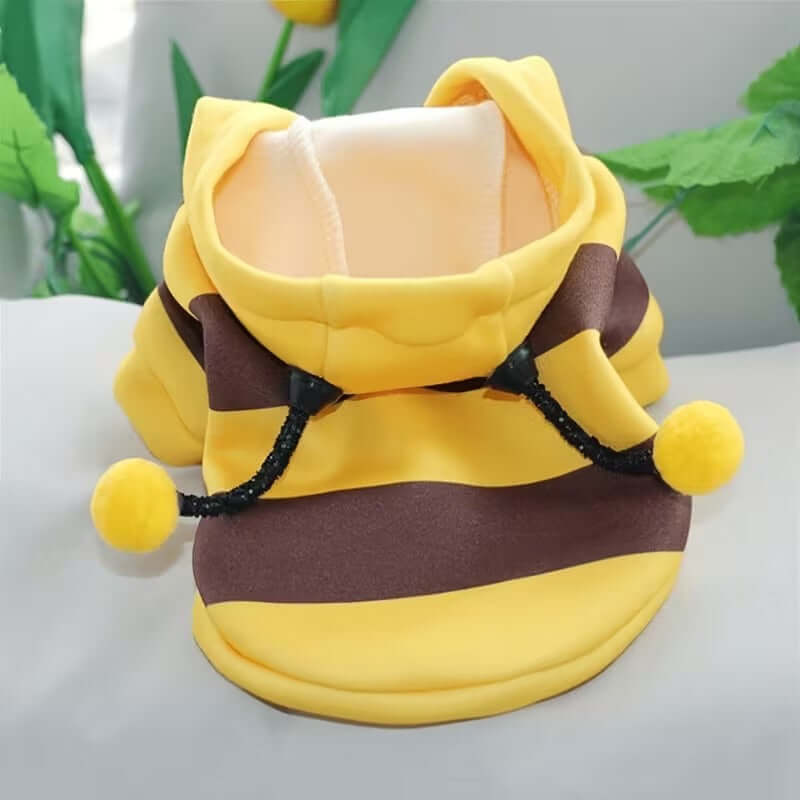 Cute Bee Puppy Costume for Small Dogs – Warm & Cozy Pet Outfit featuring yellow and brown stripes and pom-poms.